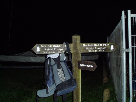 My Rucksack hanging on the Coastal Path Sign at Wells 